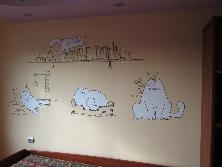 Кот саймон на стене